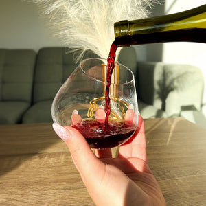 Pouring red wine into an Aequilibrium glass by Audacem