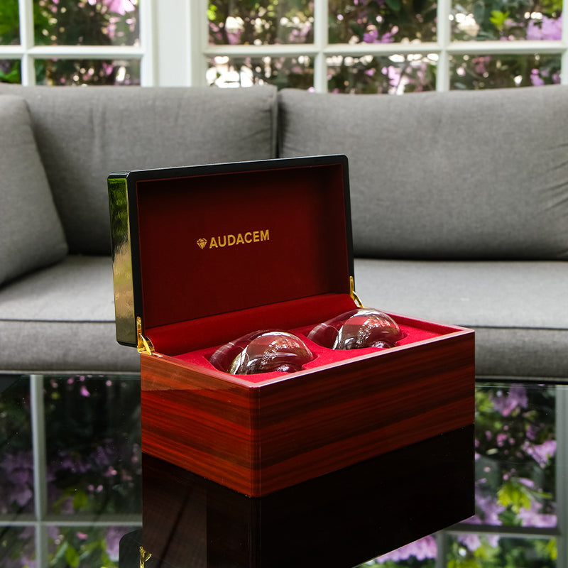 Aequilibrium Signature Set by Audacem – two hand-blown spirit glasses in a luxury wooden gift box, perfect for a 5th wood anniversary gift.