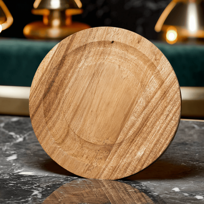 Audacem round wooden coaster flat side displayed on marble table with golden decorative background elements